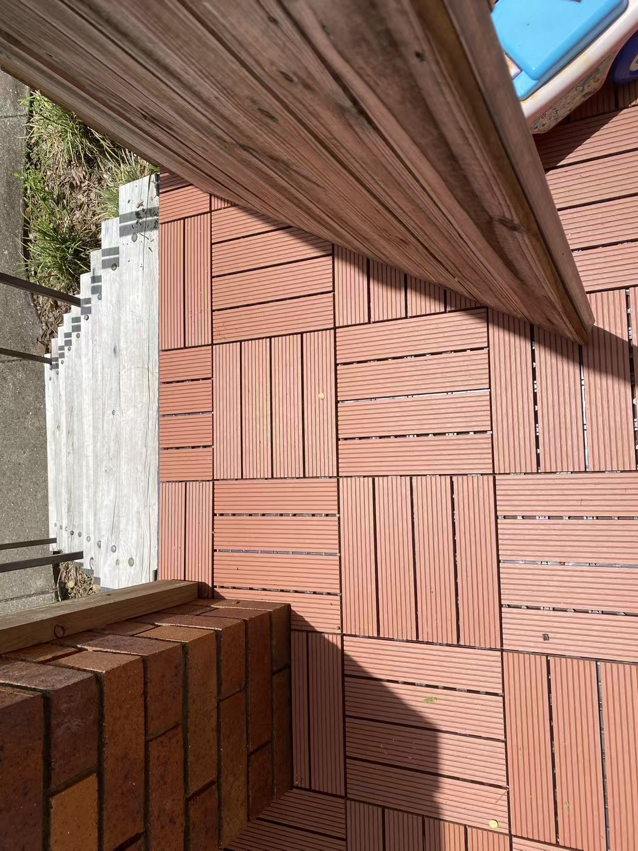 Detailed view of the alternating deck tile pattern