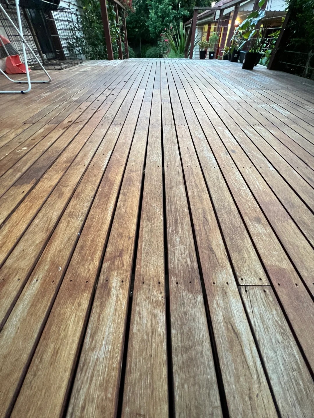 Weathered deck boards before restoration