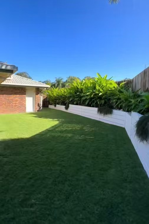 Long landscaped garden edge with a clean light finish