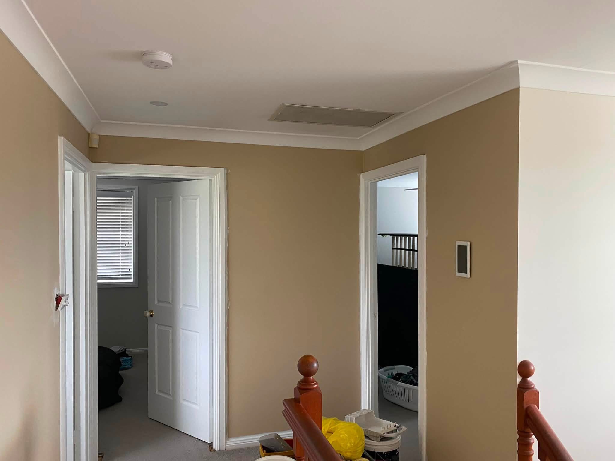 Internal door openings and architraves viewed from a stair landing