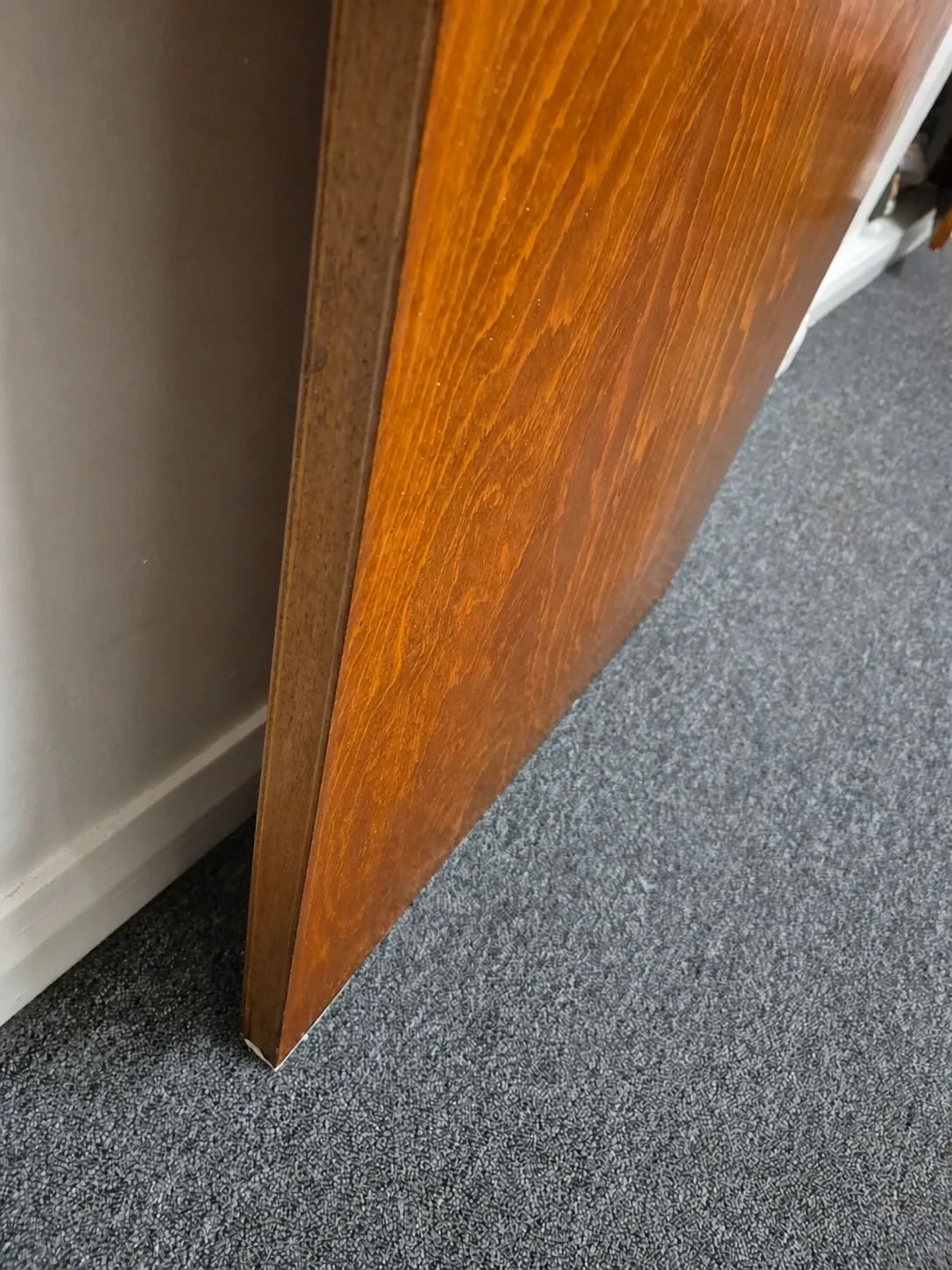Illustrated completed condition of the repaired lower timber door edge
